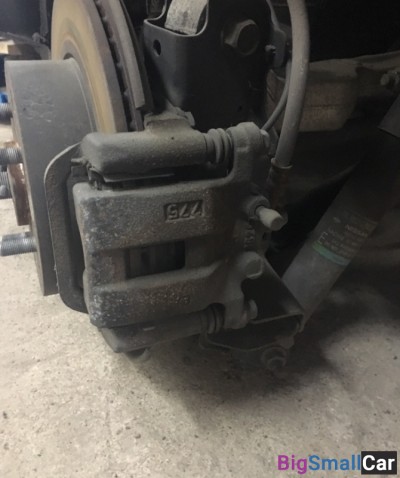 Суппорт задний левый Ниссан х треил 2.0 2008